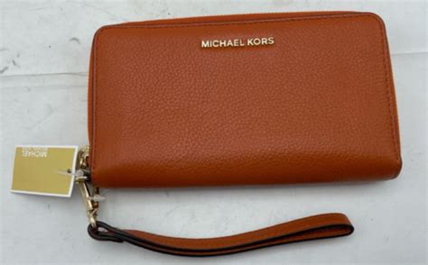 michael michael kors mercer large leather smartphone wristlet in orange|Large Scalloped Leather Smartphone Wristlet .